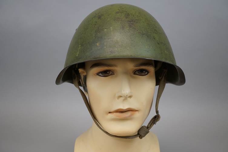 A mannequin head with a helmet

AI-generated content may be incorrect.