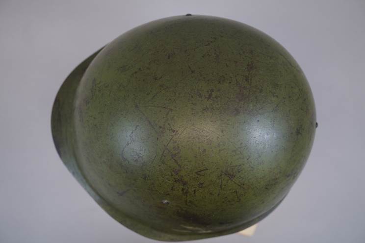 A green helmet on a white background

AI-generated content may be incorrect.