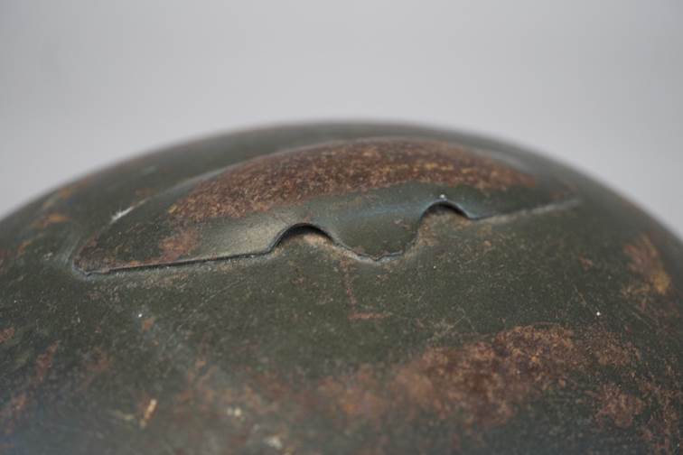 Close-up of a metal object

AI-generated content may be incorrect.