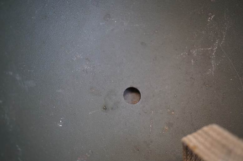 A hole in a concrete floor

AI-generated content may be incorrect.