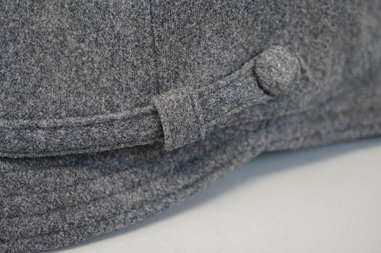 A close-up of a hat

AI-generated content may be incorrect.