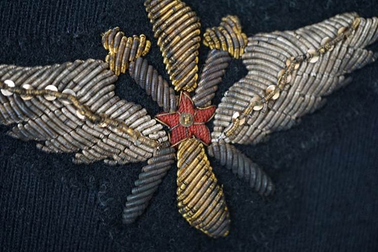 Close-up of a embroidered patch

AI-generated content may be incorrect.