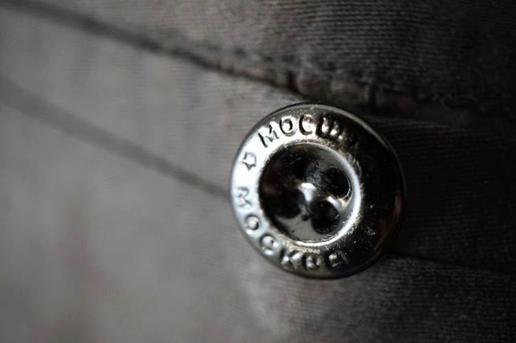 A close-up of a button

AI-generated content may be incorrect.