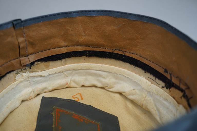 A close-up of a hat

AI-generated content may be incorrect.