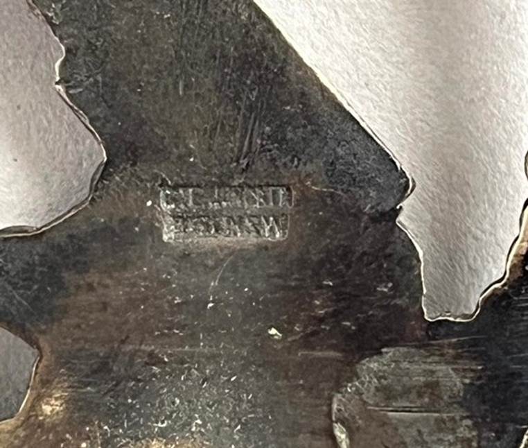 A close up of a metal object

AI-generated content may be incorrect.