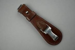 A brown leather case with a silver buckle

Description automatically generated