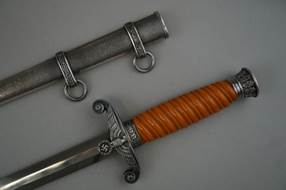 A picture containing weapon, cold weapon, melee weapon, tool

Description automatically generated