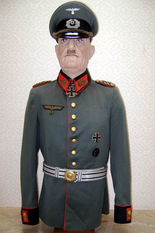 A person in a uniform

Description automatically generated with medium confidence