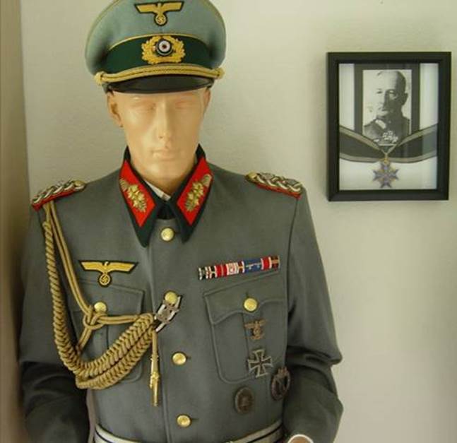 A person in a uniform

Description automatically generated with medium confidence