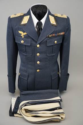 A military uniform on display

Description automatically generated with medium confidence