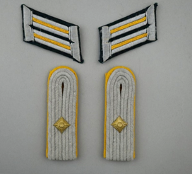 A close-up of several shoulder straps

Description automatically generated