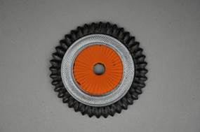 A black and orange circular object

Description automatically generated