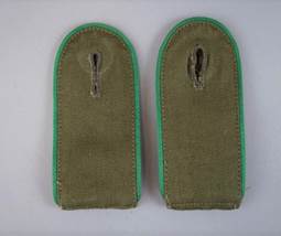 A picture containing green, accessory, case

Description automatically generated
