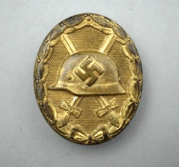 A gold object with a helmet and crossed swords

Description automatically generated