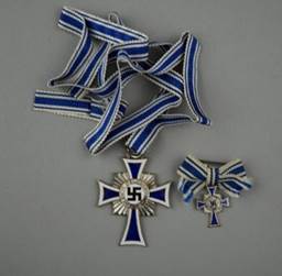 A group of medals with ribbons

Description automatically generated