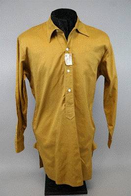 A long sleeved shirt with a tag

Description automatically generated