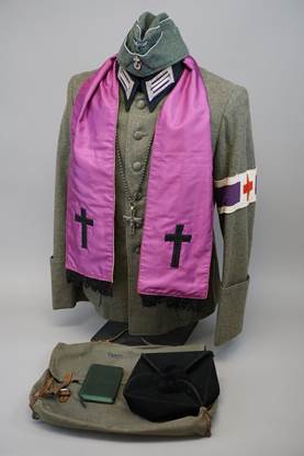 A picture containing purple, pink, suit, bag

Description automatically generated