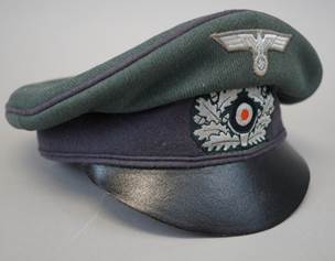 A picture containing indoor, hat, grey, gray

Description automatically generated