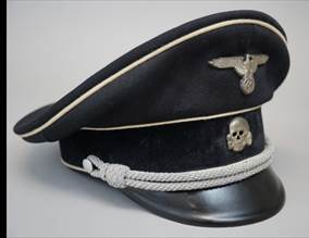 A picture containing headdress, black, hat, shoes

Description automatically generated