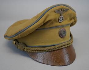 A yellow hat with a brown band

Description automatically generated